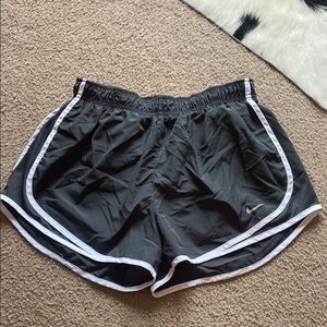 Nike Gray and White Athletic Shorts with Dolphin Hem